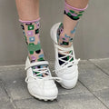 Women's silver lace-up bow sports shoes with round toe and mid-heel on a white background.