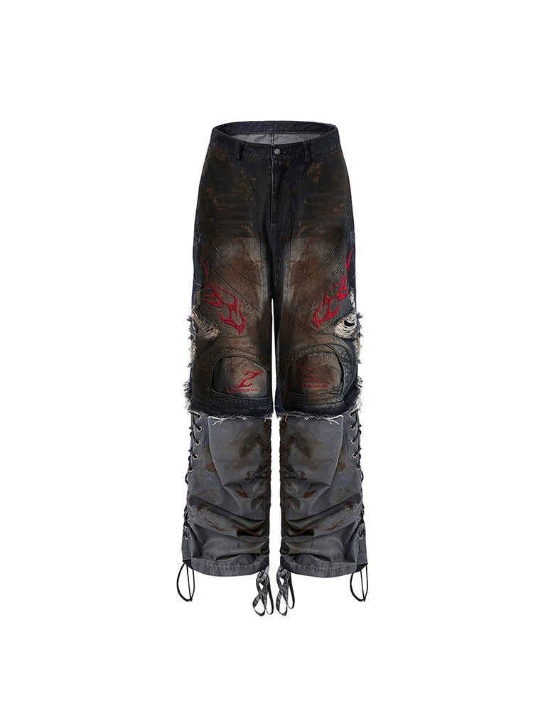Men's light blue retro jeans with detachable trouser legs, showing wide-leg loose fit.