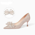Champagne coloured sequinned women's stiletto pumps with crystal embellishments and pointed toe