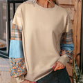 Women's loose fit long-sleeved top with plaid stitch pattern in beige colour