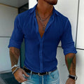 British-style loose fit men's striped long sleeve cardigan shirt on a hanger.