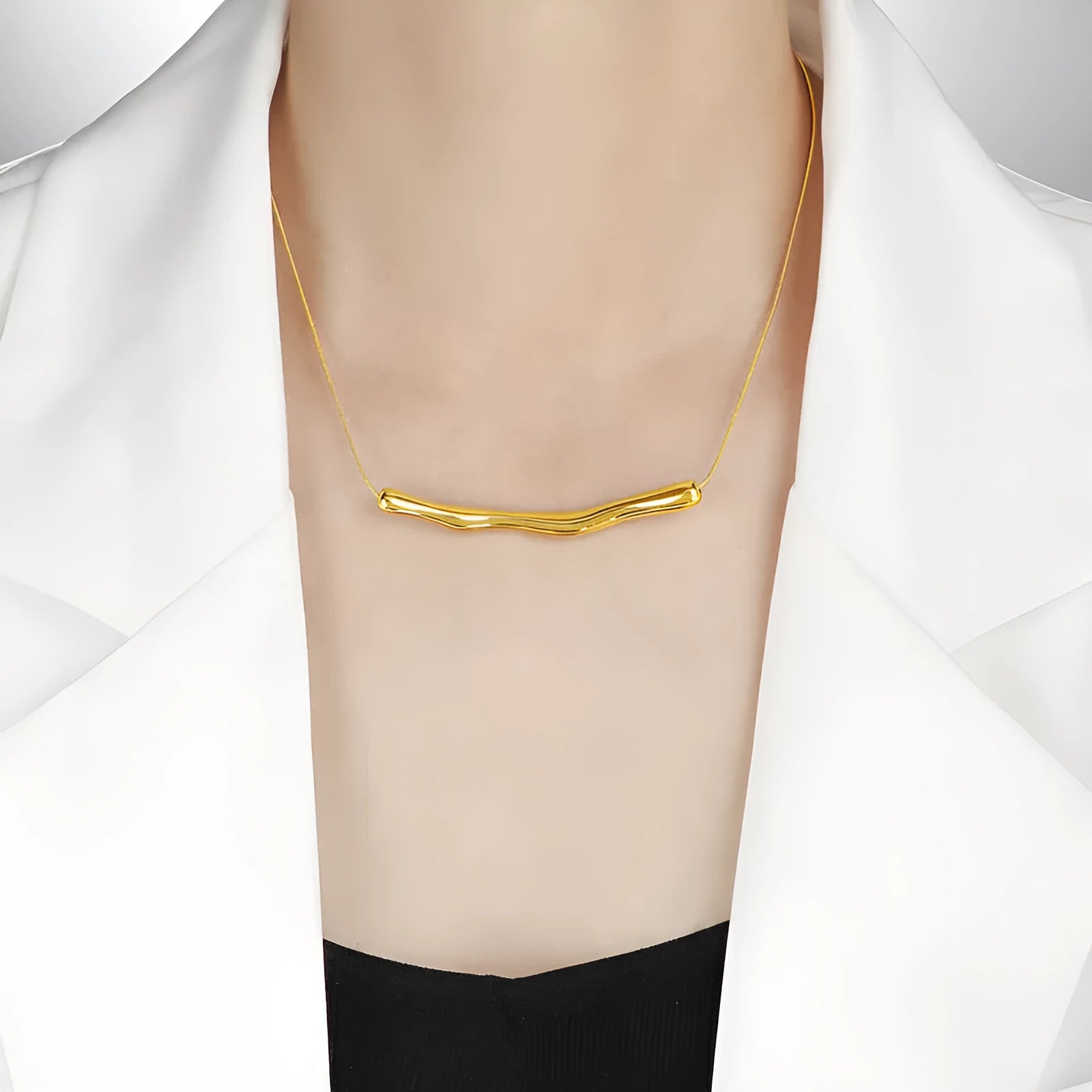 Women's titanium steel necklace with irregular pleating detail in gold or steel electroplated finish.