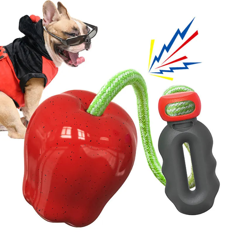 Green plastic apple-shaped dog toy with food dropping ball function and squeaker