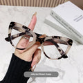 Women's large cat's eye reading glasses with dragon and phoenix decorations on the frames