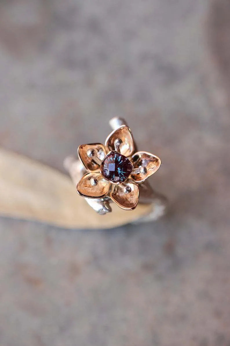 Silver two-tone floral geometric alloy ring showing detailed patterning