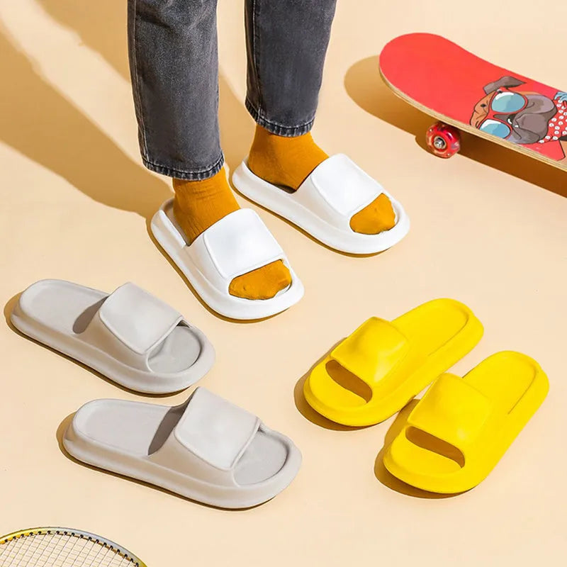 Thickened EVA non-slip flip-flop slippers in multiple colours on a bathroom floor.