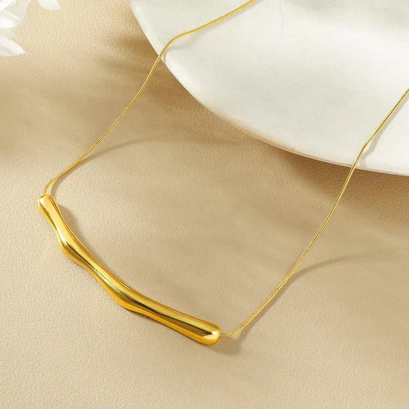 Women's titanium steel necklace with irregular pleating detail in gold or steel electroplated finish.