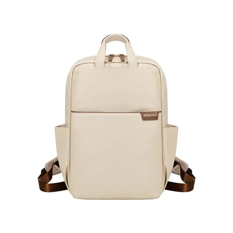 Large women's travel backpack with multiple compartments in apricot colour