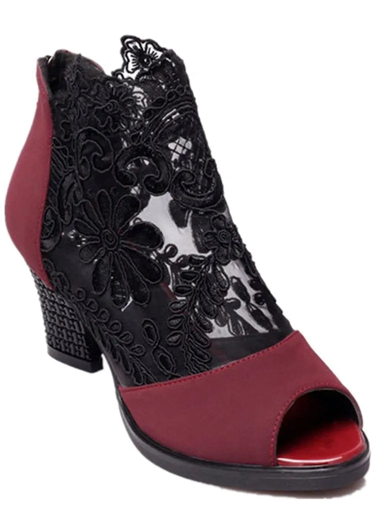 Black women's gladiator sandals with flower lace pattern and square heel on rubber outsole