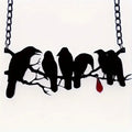 Black electroplated alloy crow necklace with cross chain design and zodiac elements