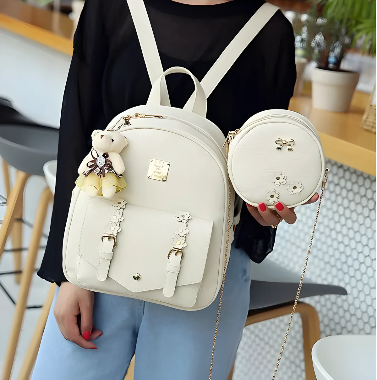 Women's floral print PU leather 3-piece bag set showing backpack, shoulder bag, and card wallet.