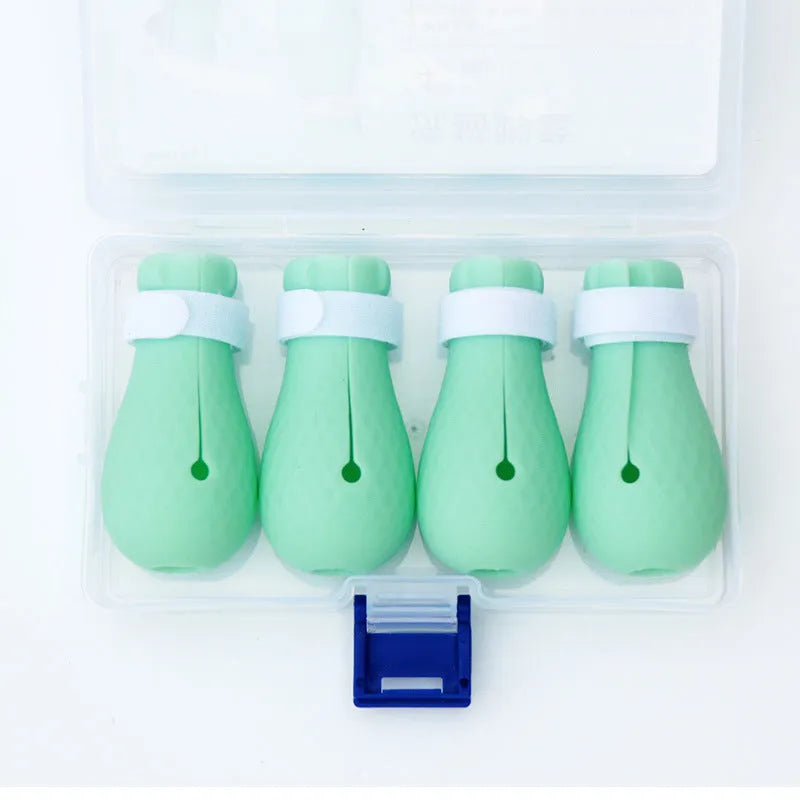 Translucent green silicone cat anti-scratch foot covers for pet handling protection