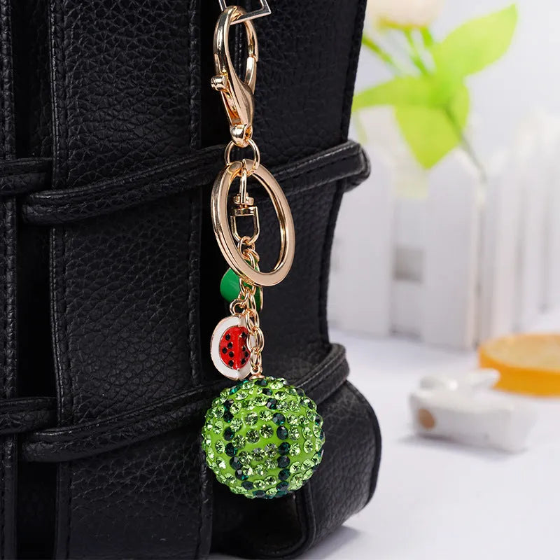Green watermelon keychain made from zinc alloy measuring 12cm with detailed fruit design and metal clasp