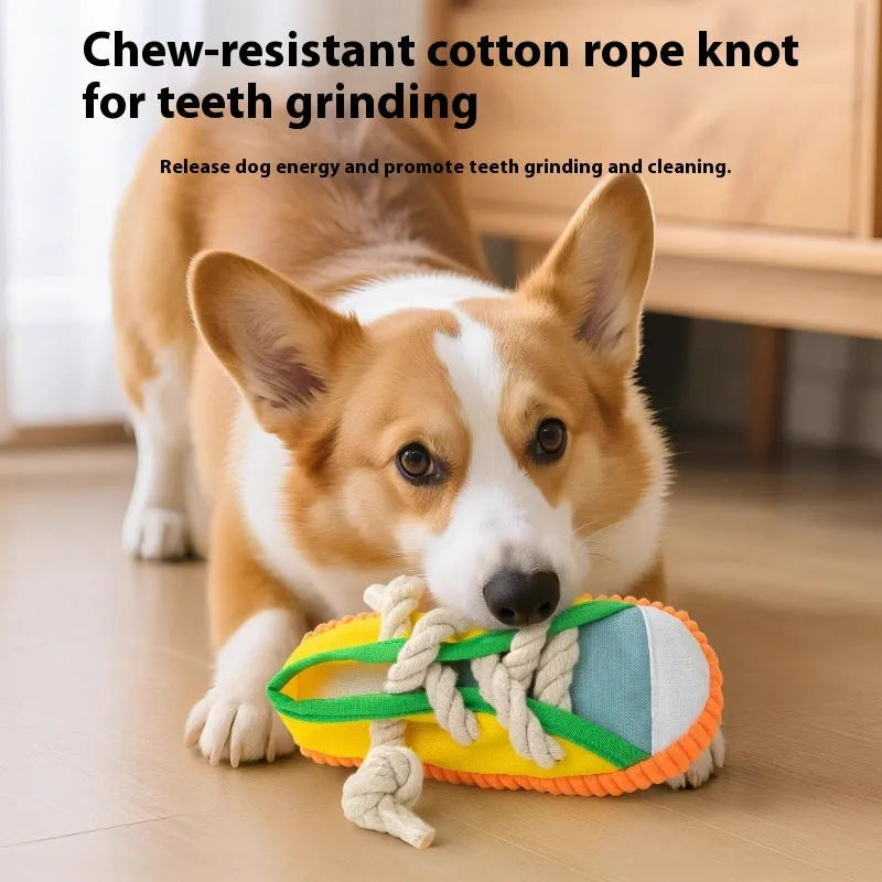 Plastic slipper-shaped dog chew toy with squeaker in yellow, black, or blue.