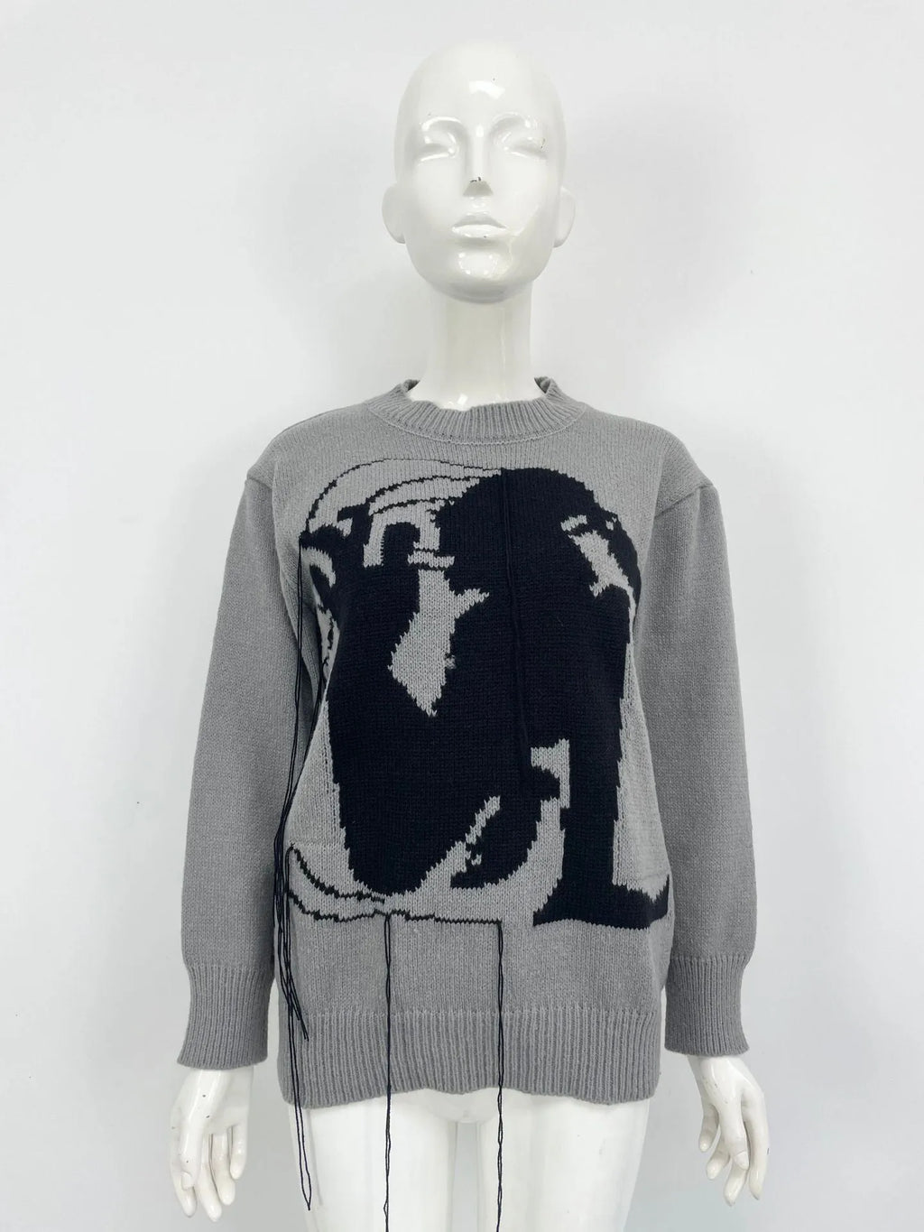 Women's alpaca wool sweater with abstract pattern and tassel design in loose street fashion style