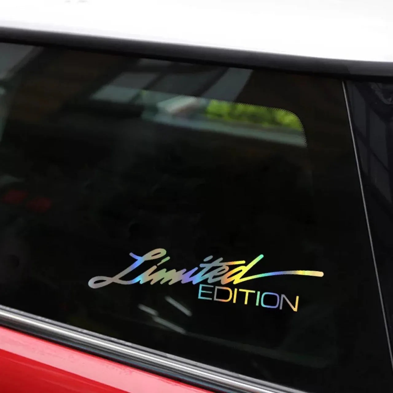 Black laser reflective car sticker with custom text design on PET film for vehicle windows or bodywork.