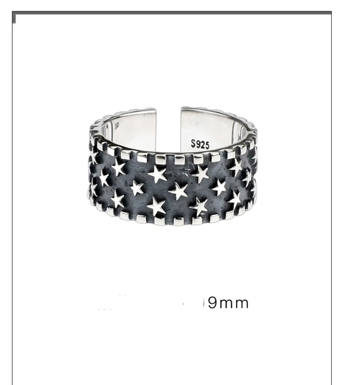 Close-up of an adjustable silver ring with a geometric multi five-pointed star design on a neutral background.