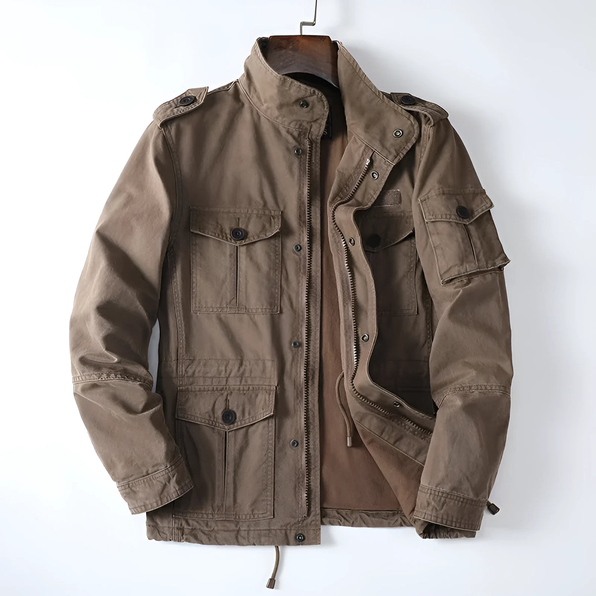 Men's loose fit cotton twill jacket in light army green with zip front, shown on a model.