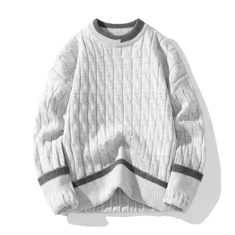 Two loose fit men's long sleeve pullover sweaters folded, shown in light blue and grey colour options.