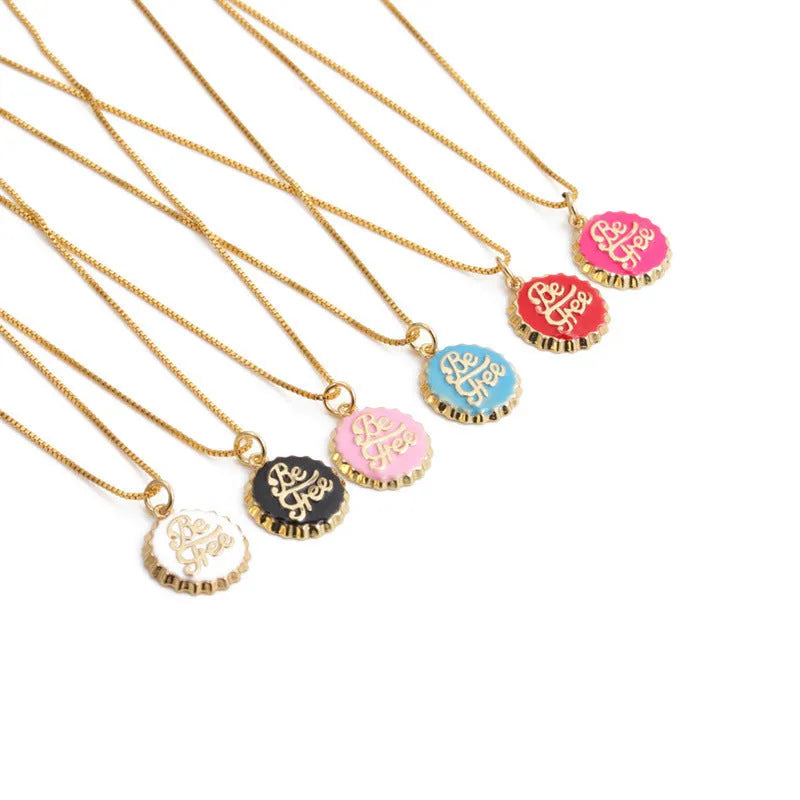 Copper bottle cap pendant necklace with gold electroplating on a 40cm box chain.