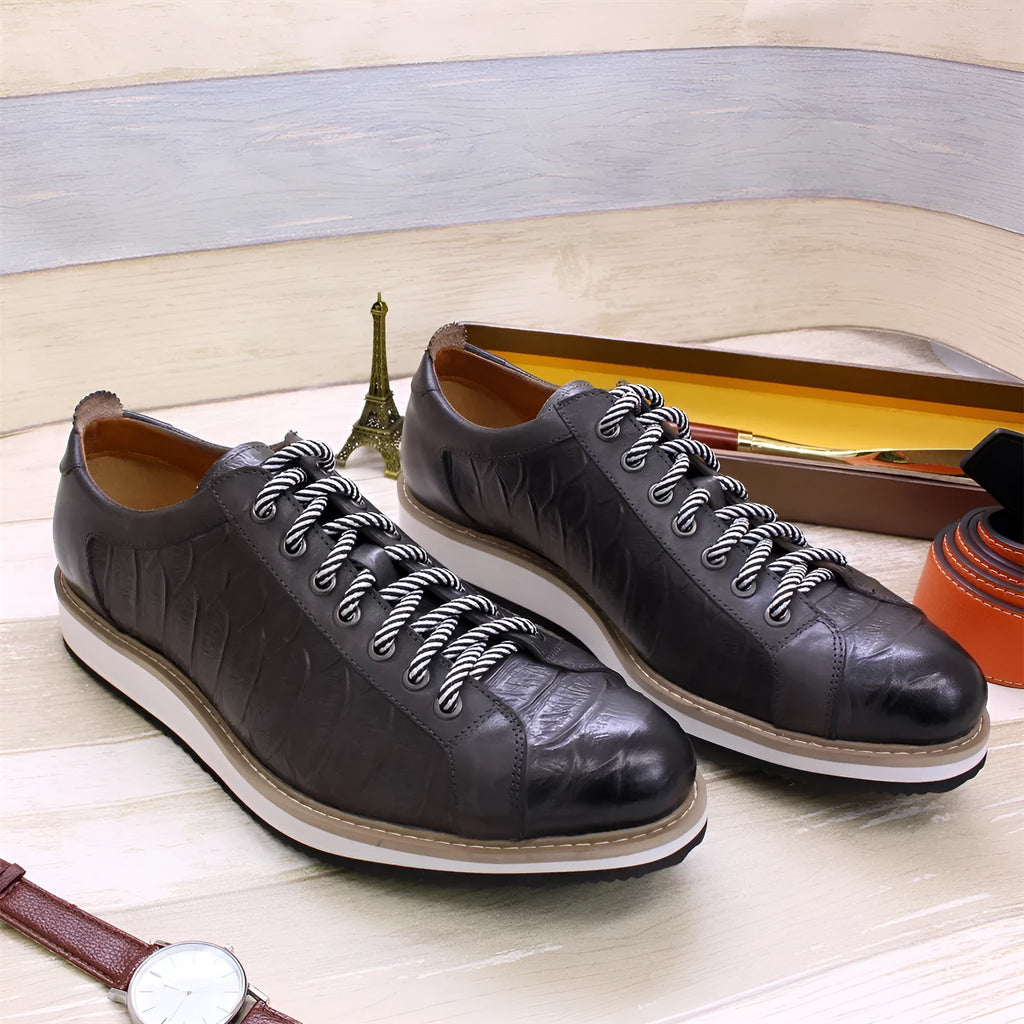 Men's handmade low-tube shoes with embossed pattern design and front tie closure in multiple colours