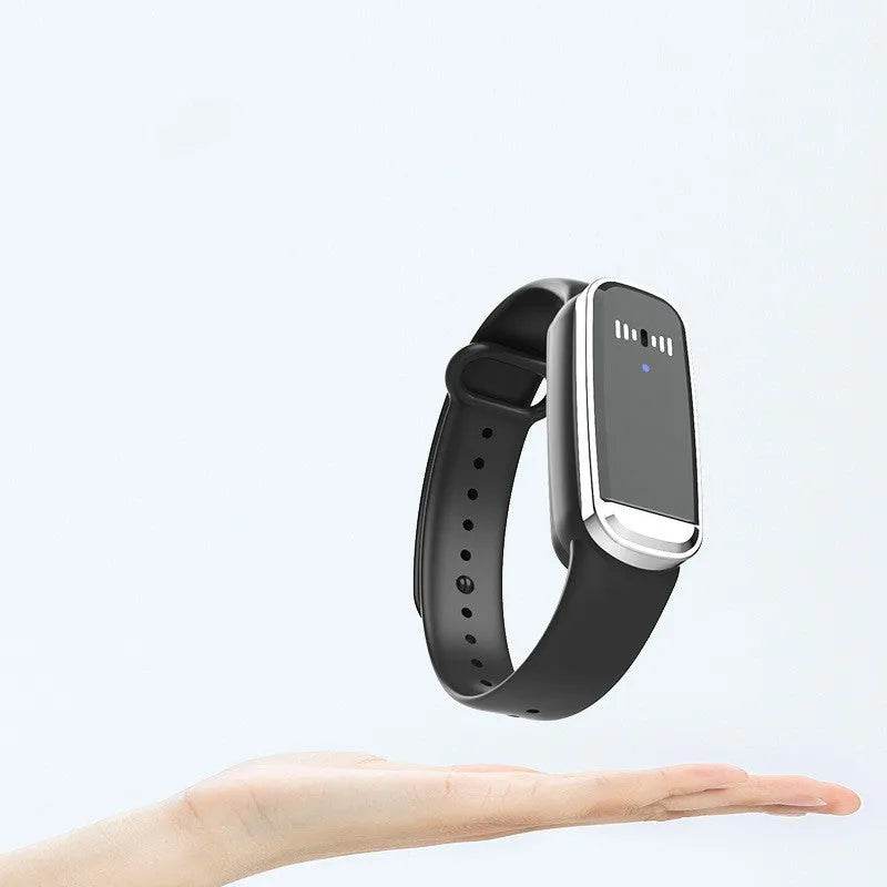 Black and white ultrasonic mosquito repellent bracelet with USB charging cable.