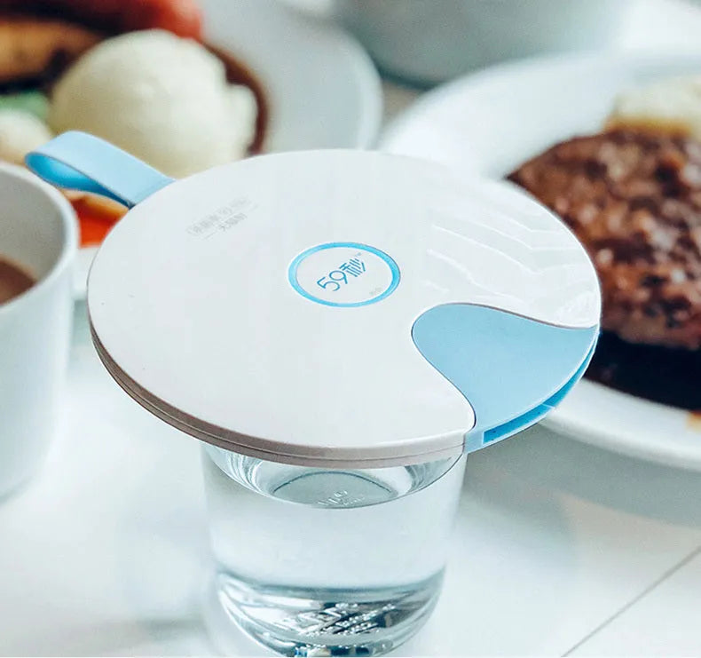 Portable UV-C baby bottle steriliser in blue with USB charging cable and compact travel size