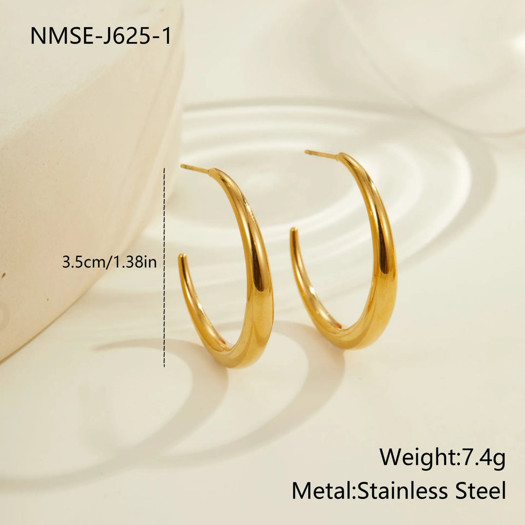 Simple geometric round hoop earrings in gold and steel finish made of stainless steel with 18K PVD plating