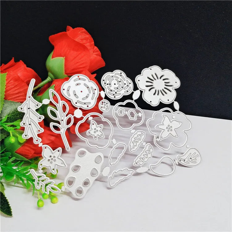 Silver carbon steel flower knife mold for paper cutting measuring 14.3 by 9.9 cm with etched plant design