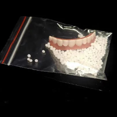 Silicone simulation smile dentures in colour box packaging for dental training