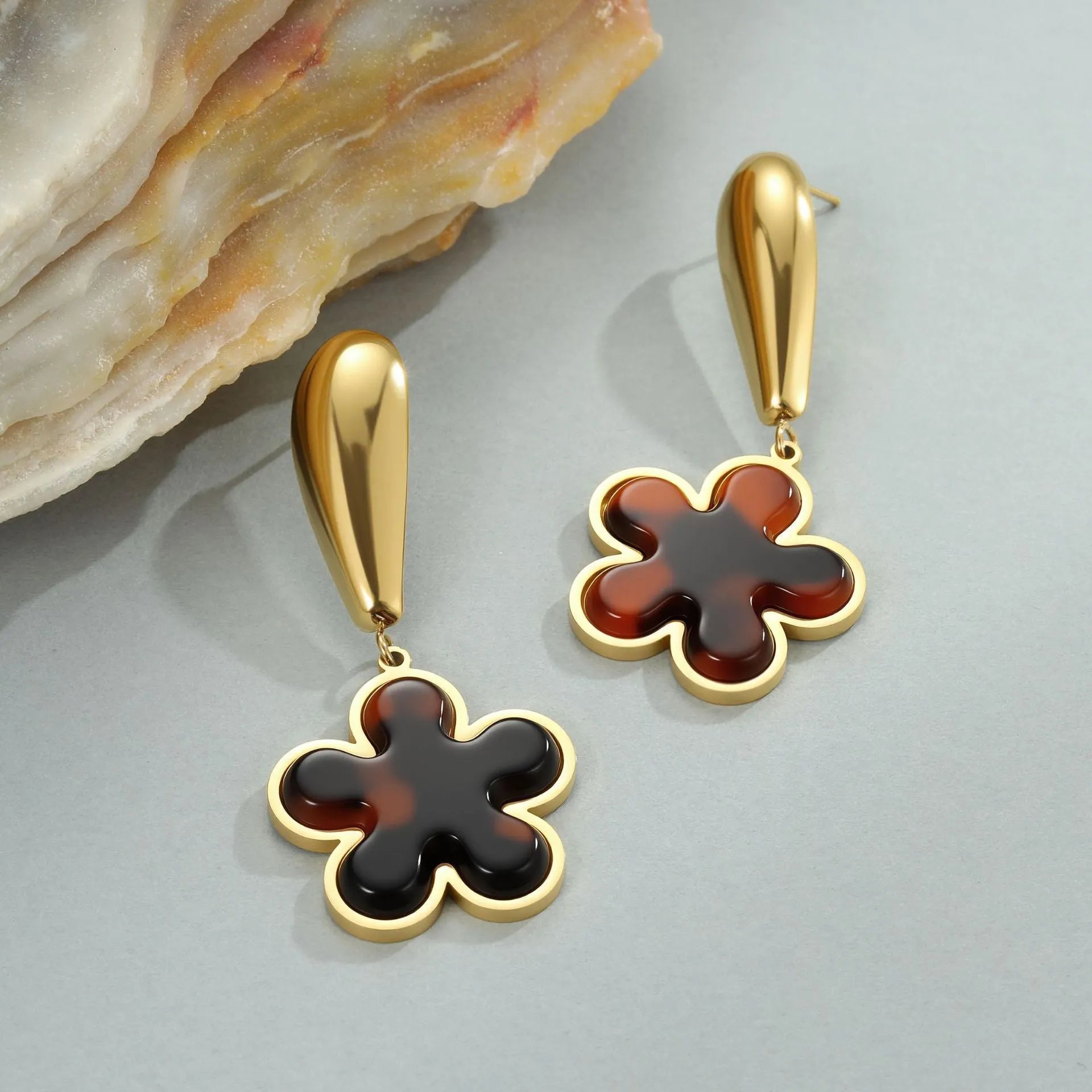 Tortoiseshell resin hawksbill colour earrings with 18K gold plating on stainless steel, showing heart and flower geometric designs
