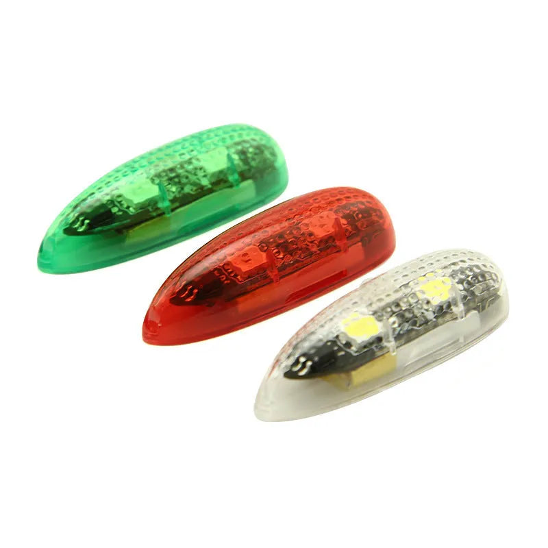 Three small V3 wireless charging waterproof LED navigation lights with adhesive backing for model boats and cars.