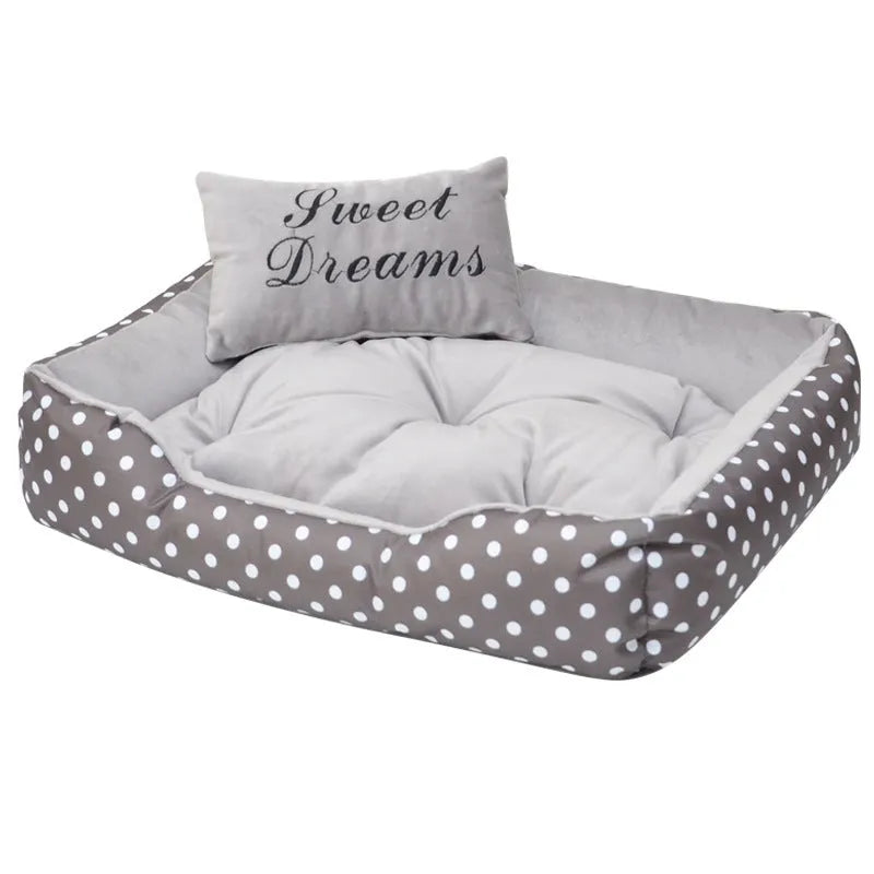 Polka dot printed square dog bed with raised edges and a matching embroidered pillow in grey, for small dogs.