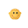 Orange and yellow spiky latex squeaky dog toys showing animal designs and textured surface