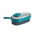 Blue automatic cleaning brush with soft bristles and a matching spare head on a white background.