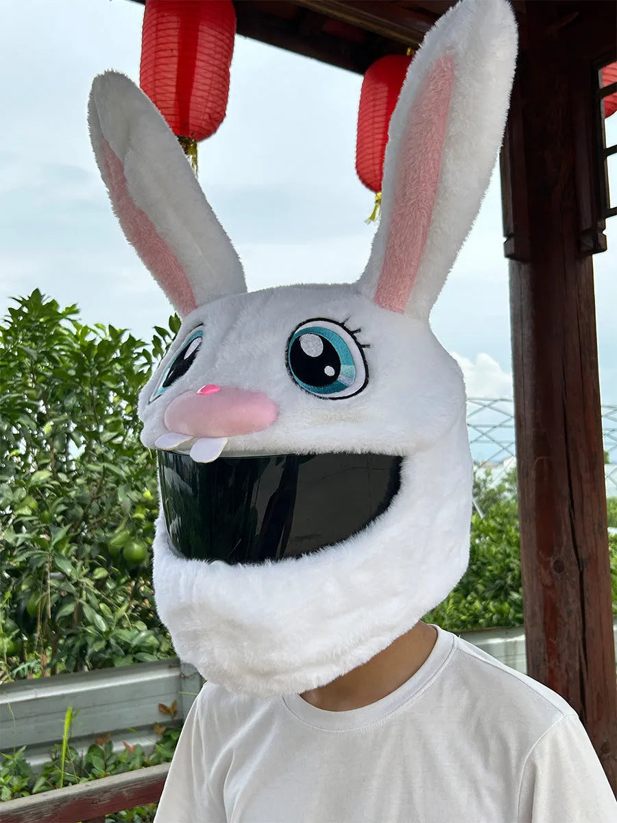White long-eared rabbit head plush cover on an electric motorcycle helmet.