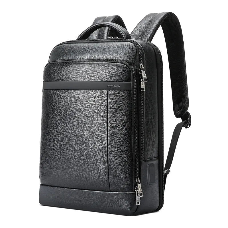 Black men's genuine leather commuter backpack with USB port and sewing line detail.