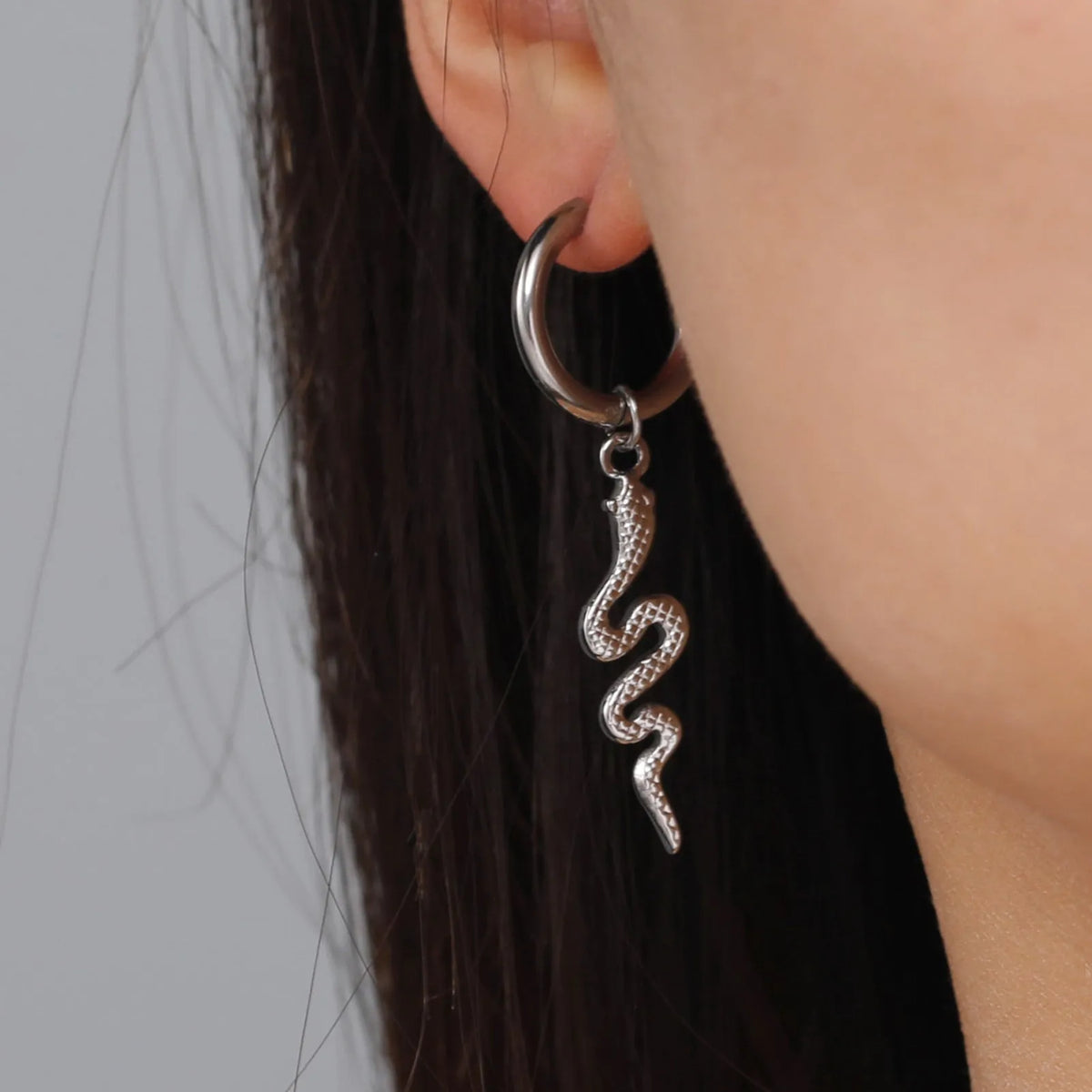 Gold plated snake-shaped stainless steel clip earrings with vintage animal design