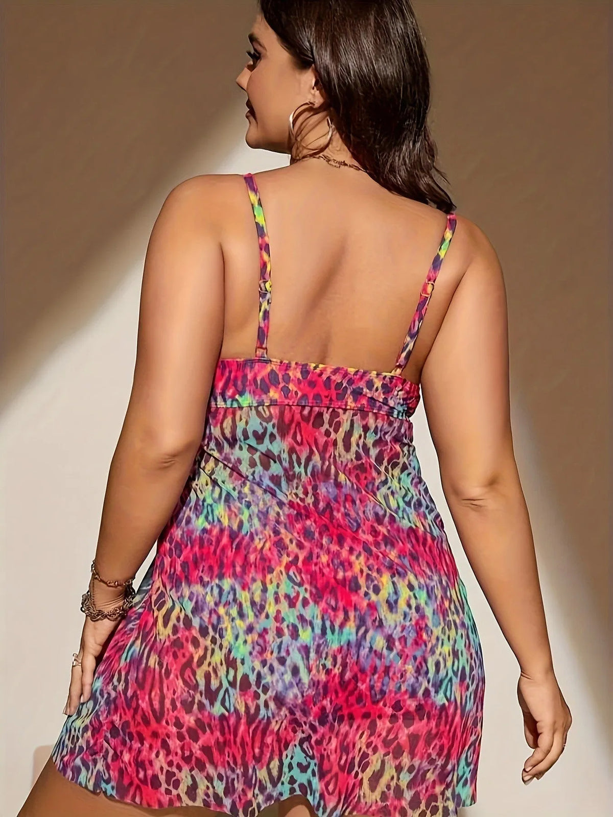 Plus size split skirt bikini set in red colour showing sleeveless top and shorts with skirt design