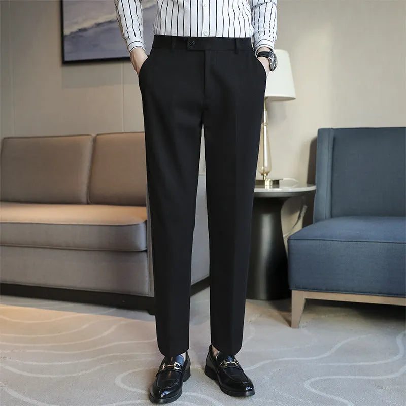 Straight cut brown corduroy trousers with elastic waistband shown front and back views