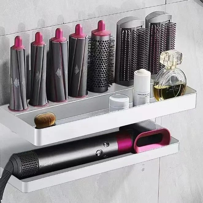 White aluminium double-layer bathroom storage rack mounted on wall holding hair styling tools