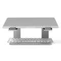 Black aluminium alloy laptop stand on a desk, showing its size and solid base plate.