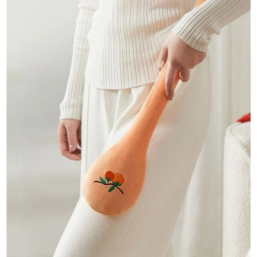 48 cm persimmon coloured back pounding percussion therapy stick with meridian flap design