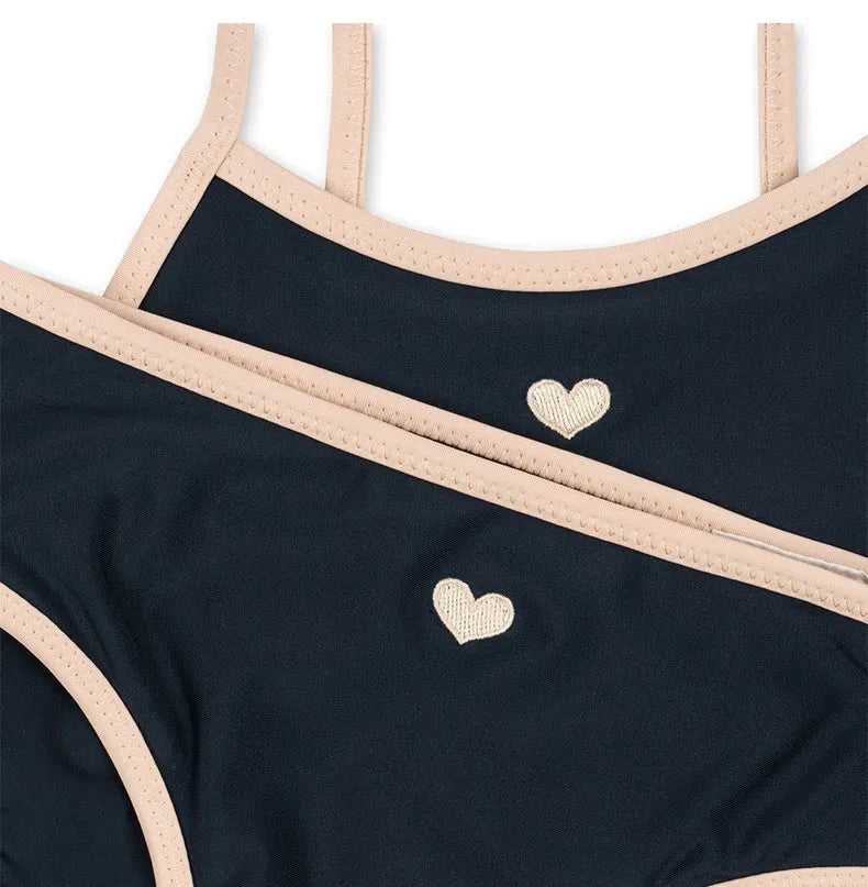 Dark blue split girl's swimsuit with briefs-style design for swimming and wading activities