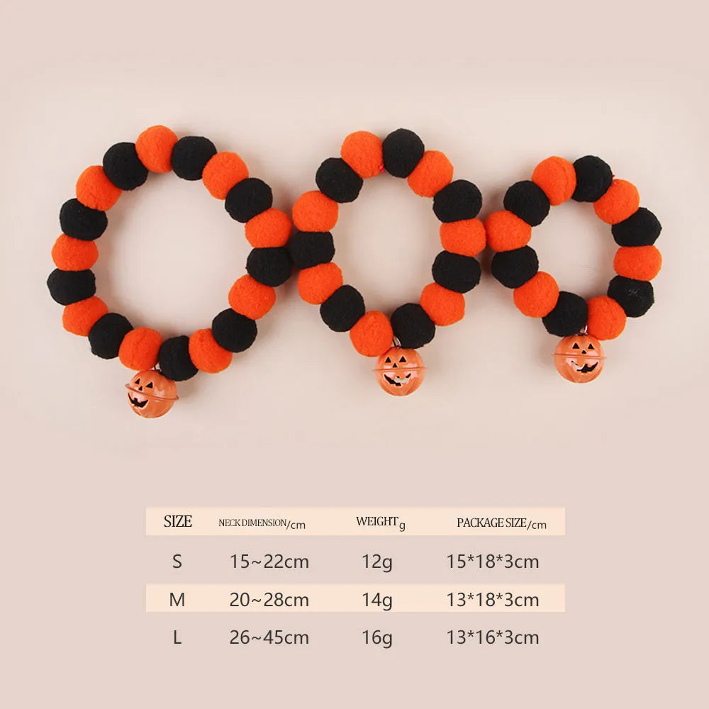 Black, orange, green, and purple Halloween pumpkin cat collar with adjustable strap.