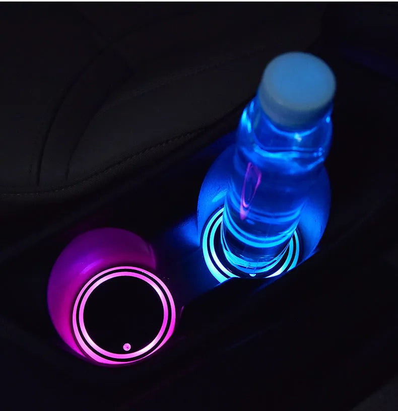 LED light-up cup coaster for cars showing seven colour modes and USB charging cable