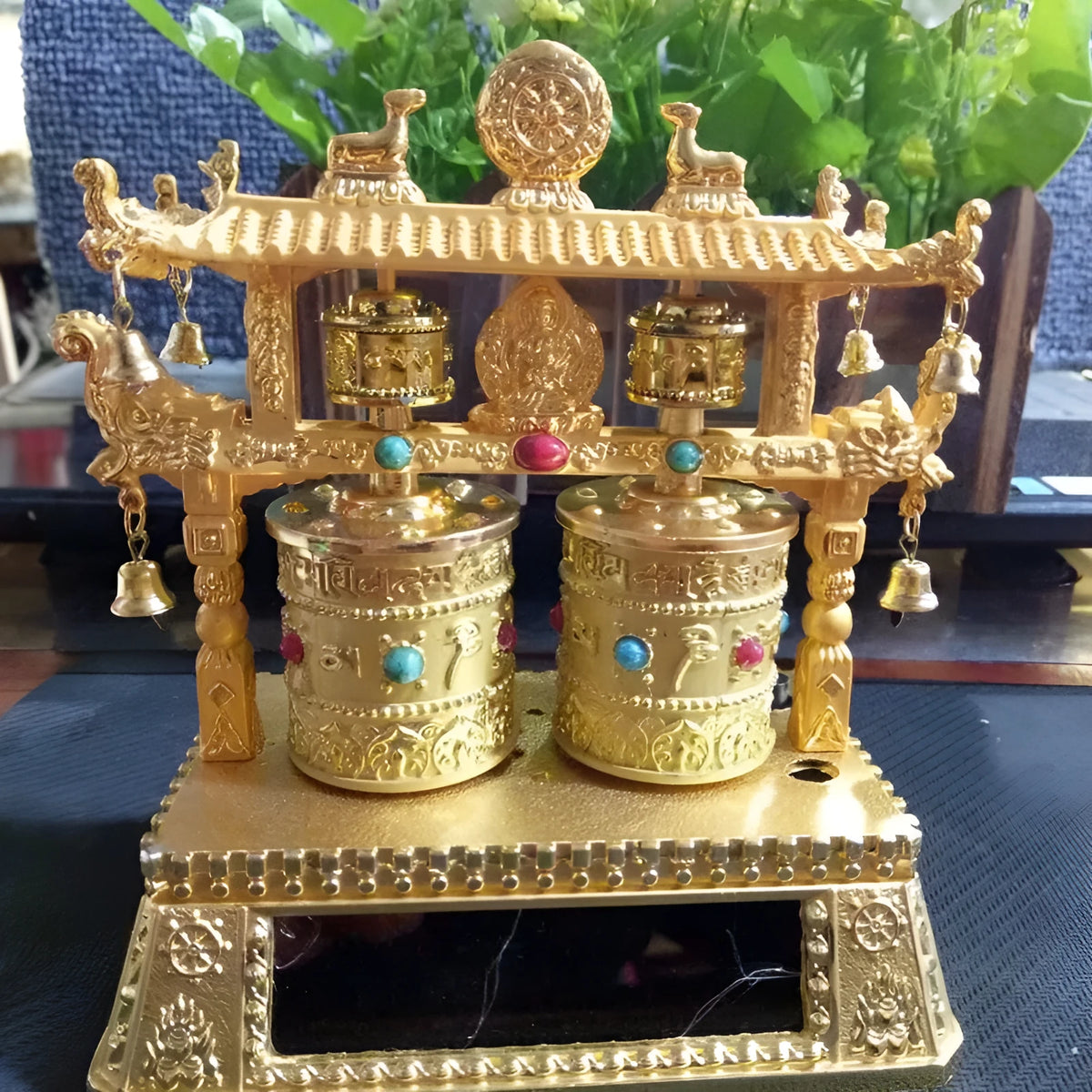 Traditional Chinese style alloy car prayer wheel decoration measuring 12 by 15 by 8 centimetres