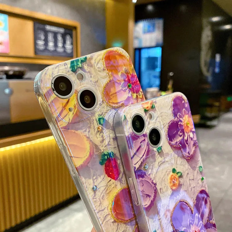 Soft rubber mobile phone case with purple oil painting flower design and inlaid diamond accents.