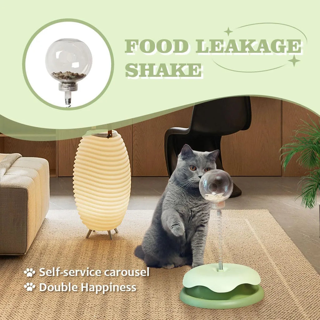 Blue and green interactive cat treat dispenser toy with track ball, measuring 21.5 by 32 cm.