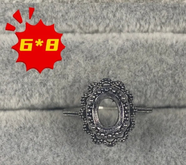 Oval denier ring with open mouth design and five-pointed star detail on electroplated copper